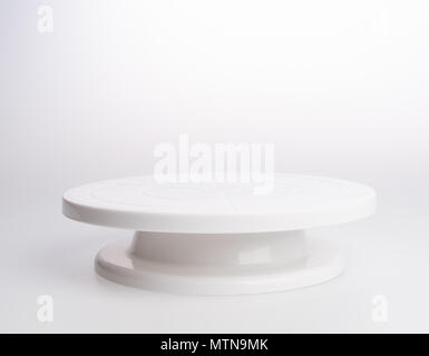cake stand or rotating cake stand on a background Stock Photo