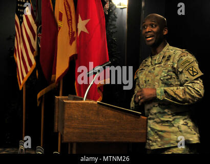 Brig. Gen. Xavier Brunson, 10th Mountain Division (LI) Deputy Commanding General, addresses approximately 200 Soldiers and members of the Fort Drum community at an observance honoring Dr. Martin Luther King Jr. at the Commons on January 11, 2017. Brunson highlighted King's message and achievements, urging Soldiers and the community to continue his work. Stock Photo