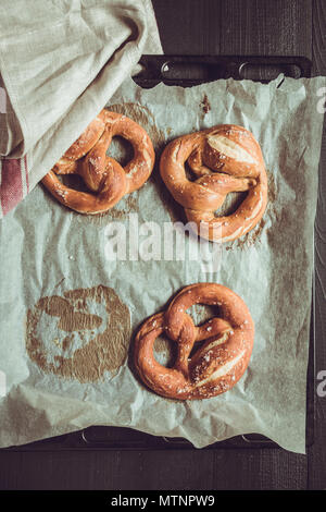 Rustic Look Pretzels From the Oven on Baking Sheet Stock Photo