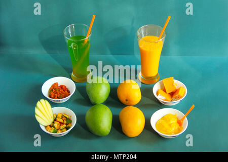 Raw and ripe alphonso mango and their by-products like pickle, mango shake, sweet and ice cream Stock Photo
