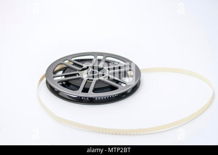 Old fashioned plastic film reel with 8 mm film Stock Photo