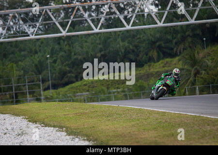 Former MotoGP World Champion Nicky Hayden astride his Honda RCV factory bike at the official MotoGP winter test at Sepang circuit in Malaysia. Stock Photo