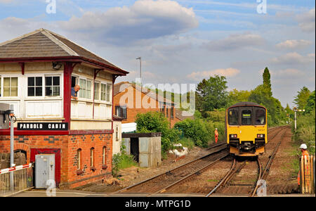 Cw 6192 150127 passes over points at Parbold 20.5.18.  Northern train unit no 150127 crosses from the down to the up line at Parbold on the 20.5.18.   Stock Photo