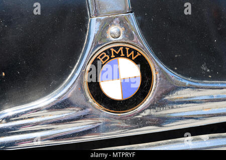 KHARKIV, UKRAINE - 27 MAY, 2018: The emblem of the car is a retro old BMW close-up. Stock Photo