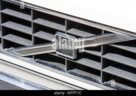 KHARKIV, UKRAINE - 27 MAY, 2018: The emblem of the car is a retro old Volvo close-up. Stock Photo