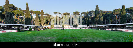Panoramic view of piazza di Siena green ground ready for equestrian competition, empty field and platform for spectators Stock Photo