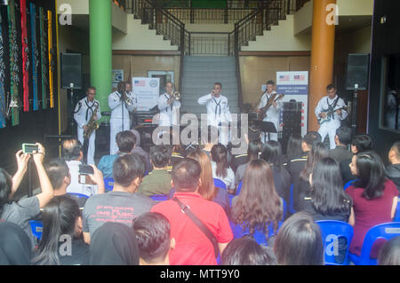 180523-N-MW280-045 KOTA KINABALU, MALAYSIA (May 23, 2018) Members of the U.S. 7th Fleet Band perform at Universiti Malaysia Sabah in Kota Kinabalu, Malaysia. The band is supporting a U.S. 7th Fleet theater security cooperation mission and will be traveling to several Indo-Pacific countries in the coming weeks. (U.S. Navy photo by Mass Communication Specialist 2nd Class Chase Hawley/Released) Stock Photo