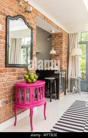 Modern interior with trendy furniture and decorative brick wall effect idea Stock Photo