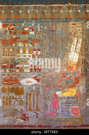 ancient egypt color images on wall in luxor Stock Photo