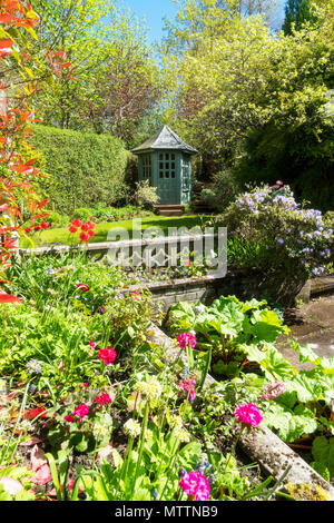 House Back garden with bespoke summerhouse and beautiful flower displays, design, Central Scotland, UK Stock Photo