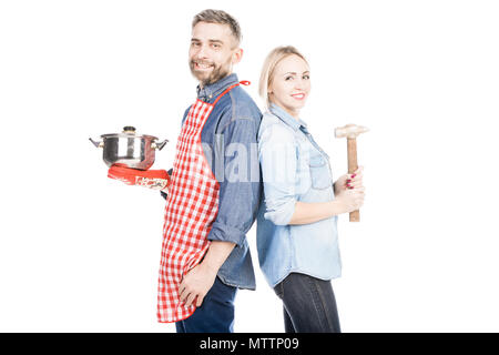 Cheerful Couple With Household Stuff Stock Photo