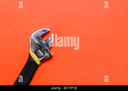 Used Pliers Tools on a orange textured background with space for text Stock Photo