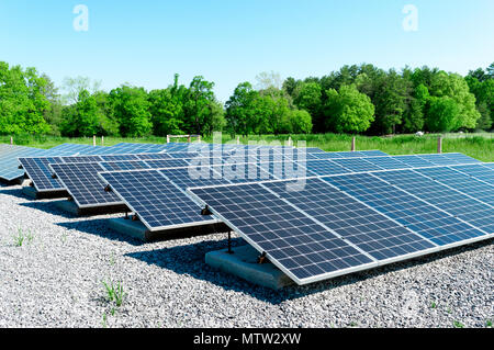 Large solar panels in a wooded area of East Tennessee. Stock Photo