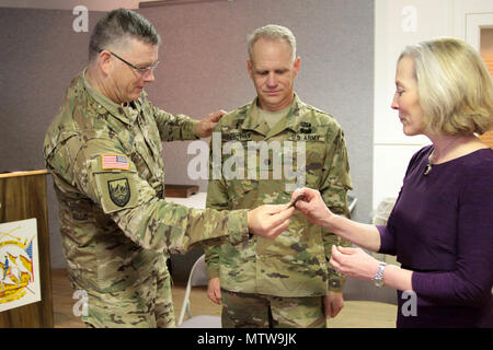 76th Division (OR) Commanding General, Maj. Gen. Ricky Waddell, promoted Command Chaplain Col. Bruce Sidebotham at his current rank, during the unit’s battle assembly January 21 at Fort Douglas, Utah. Stock Photo