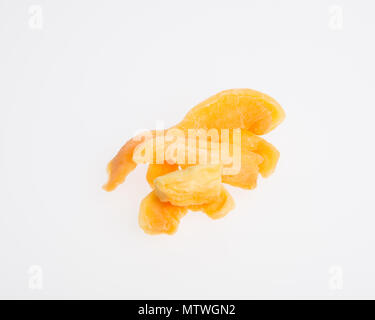 dried melon or dried fruits on a background Stock Photo