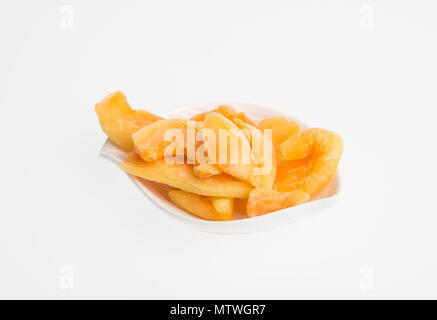 dried melon or dried fruits on a background Stock Photo