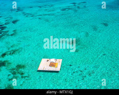 Aerial view of the landing platform for the scenic flight with parasailing, one of the main attractions of Deer Island, east coast of Mauritius, Indian Ocean. Stock Photo