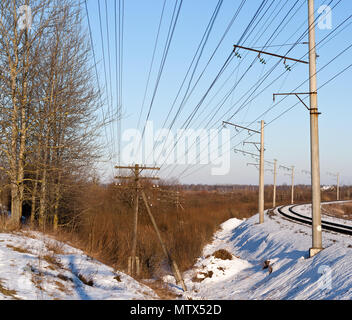 Old telegraph line along a railway Stock Photo