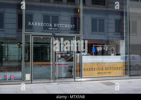 Jamie Oliver's restaurant Barbecoa Butchery in Watling St London, England, close to St Paul's cathedral in the city of London. Stock Photo