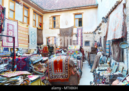 Store carpets and old things in the easten town. Stock Photo