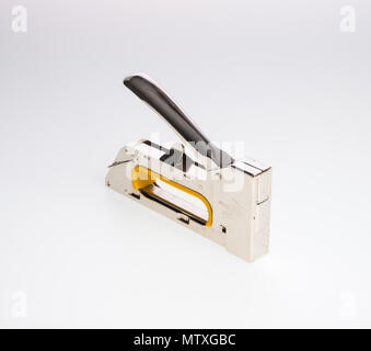 stapler or furniture stapler on a background Stock Photo