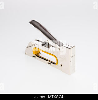 stapler or furniture stapler on a background Stock Photo