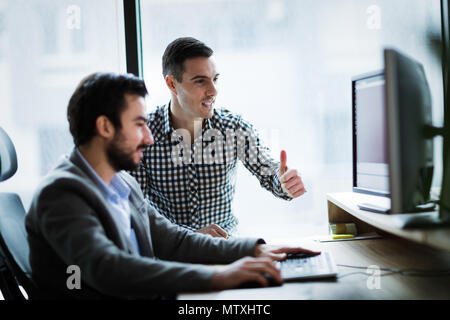Picture of business people working together in office Stock Photo