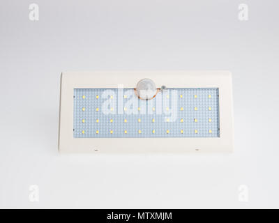 Solar LED lamp with motion sensor on a background Stock Photo