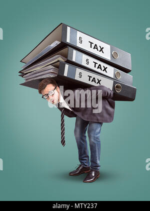 Man carrying a giant stack of tax folders Stock Photo