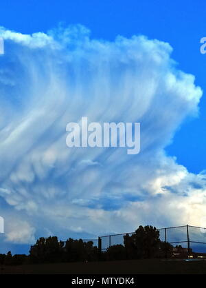 Dramatic cloudscape with strange cloud shapes before sunset Stock Photo