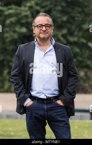 London, UK. 31st May 2018. David Breuer-Weil at the unveiling of his latest monumental sculpture, Flight at Marble Arch in London. The sculpture depicts a flying man taking off from Marble Arch. Credit: Vickie Flores/Alamy Live News Stock Photo