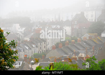 Portland. 31st May 2018. Heavy rain and thick mist blankets the village of Fortuneswell, Isle of Portland Credit: stuart fretwell/Alamy Live News Stock Photo