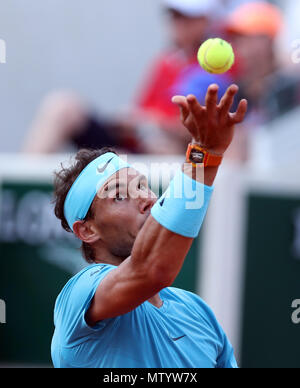 Paris. 31st May, 2018. 1st seeded Rafael Nadal of Spain serves during the men's singles second round match against Guido Pella of Argentina at the French Open Tennis Tournament 2018 in Paris, France on May 31, 2018. Credit: Luo Huanhuan/Xinhua/Alamy Live News Stock Photo
