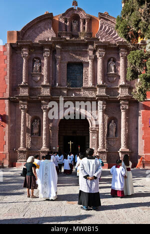 Devout Catholics prepare for the Good Friday Procession (Santa Entierro) at the ORATORIO CHURCH - SAN MIGUEL DE ALLENDE, MEXICO Stock Photo