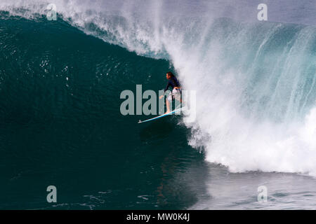 Surfer at Honolua Bay, Maui, Hawaii. Stock Photo