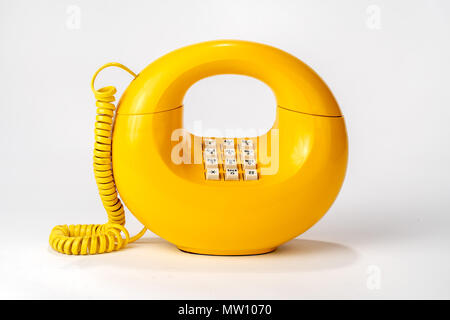Old Circular Retro Telephone, one piece rotary dial on bottom Stock Photo