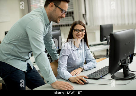 Young couple learning in the classroom Stock Photo