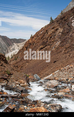 A stream running through the mountains in California on a clear spring day. Stock Photo