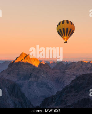 Hot air balloon over Mount Moses Sinai sunset Stock Photo