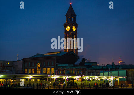 Hoboken Train Station Clock Tower lit up at night Stock Photo