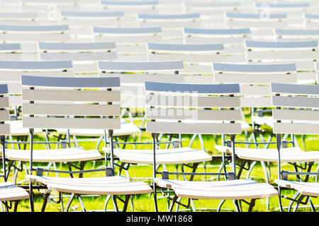 White chair rows in a spa park dark light Stock Photo