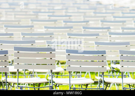 White chair rows in a spa park in bright light Stock Photo