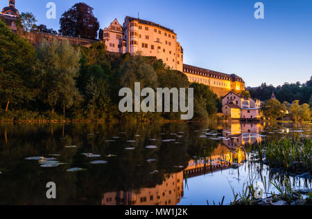 Weilburg Castle, reflection in the river Lahn, dusk, Weilburg an der Lahn, Hesse, Germany Stock Photo