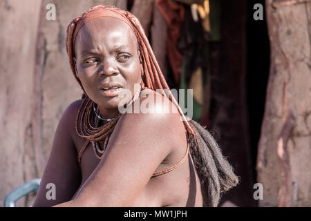 Africa, Namibia. Himba Tribe Village. Man and woman posing Stock Photo