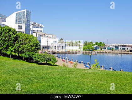 The Northcoast Harbor off Lake Erie in downtown Cleveland, Ohio is filled with greenspace and attractions including the Great Lakes Science Center. Stock Photo