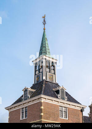 Tower of old waag, weigh house, in historic town of Makkum, Friesland, Netherlands Stock Photo