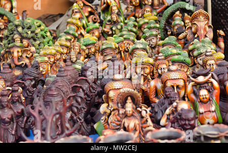 Terracotta statuettes of Buddha and Ganesha, and an assortment of other figurines on display at Shilparamam arts and crafts village, Hyderabad, India. Stock Photo