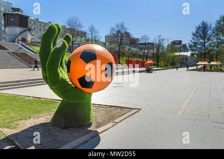 Yekaterinburg, Russia - May 23, 2018: Installation of the Hand with ball for World Cup on Historical Square on Iset River in center of city Stock Photo