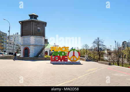 Yekaterinburg, Russia - May 23, 2018: Installation of the inscription Peace and love is Peace symbols on Historical Square in center of city Stock Photo