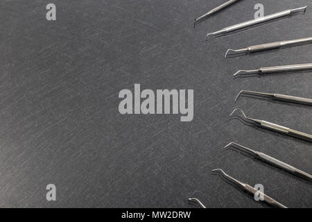 Dentist tools. Teethcare, dental health concept. Grey background top view copy space. Stock Photo